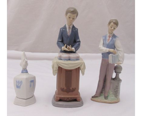 Lladro figurine of a Bar Mitzvah boy reading a scroll, Lladro figurine of a Jewish scholar and a Lladro model of a dreidel on