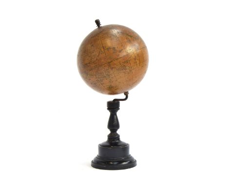 A small Smith's Terrestrial Globe, on a turned ebonised base, 30cm high overallProvenance: Sir Terence and Lady Conran