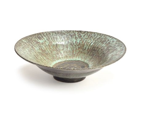 Dame Lucie Rie DBE (1902-1995), a stoneware bowl, of circular form, the interior and exterior under volcanic green glazes, 35