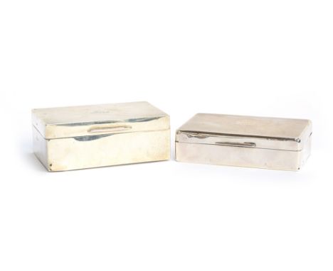 An engine turned silver cigarette box by Harrods Ltd, London 1936, 14cm wide; together with a further similar cigarette box b