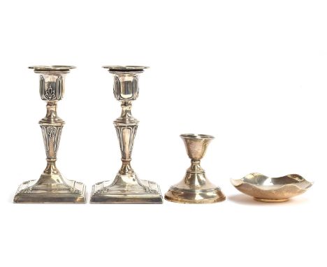 A pair of late Victorian loaded silver candlesticks by George Wish and Jenkins &amp; Timm, Sheffield 1897, 15cm high; togethe