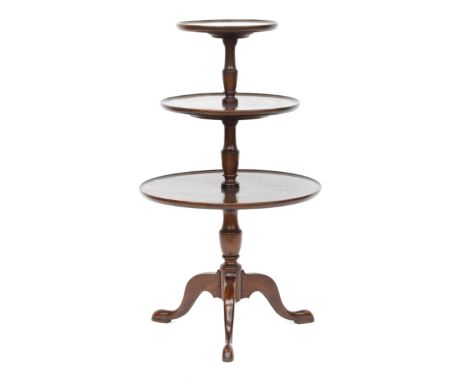A George III style mahogany three tier dumb waiter, with three dished tiers, on a cabriole tripod base, 60cm diameter, 100cm 