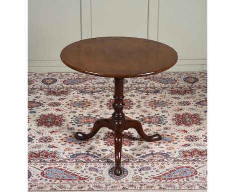 A George III mahogany tripod table, c.1760, the tilt top with a 'birdcage', 76.5cm diameter, 70cm high
