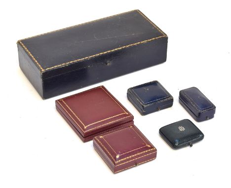 A collection of antique jewellery boxes to include a small green leather Boucheron box with silver 'DH" monogram applied to l