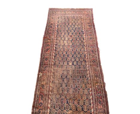 A late 19th century Persian carpet, probably Hamadan, 560x205cmProvenance: Sir Terence and Lady Conran