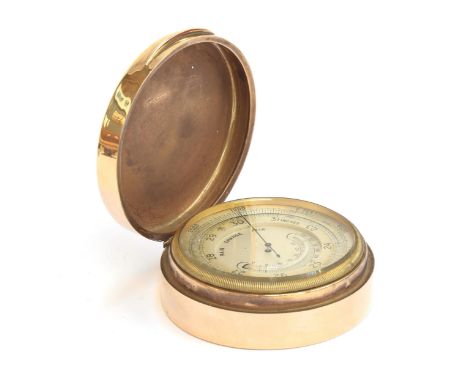 A 1920s Cartier 9ct gold cased pocket barometer, the lid engraved D.M.C, marked Cartier to base, 7.5cm diameter
