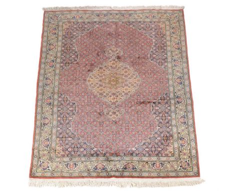 A Tabriz carpet, approximately 298 x 199cm