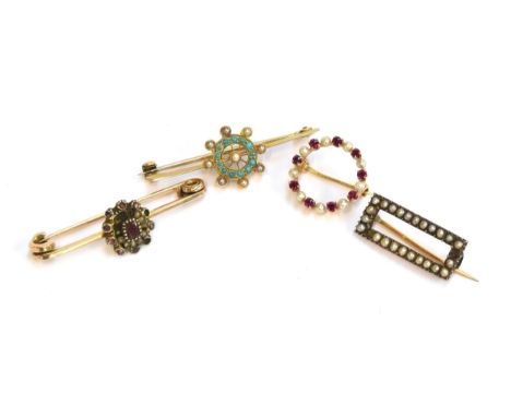 A collection of four gold brooches: one 14ct gold circular brooch set with rubies and seed pearls, 1.2cm diameter; a wheel sh