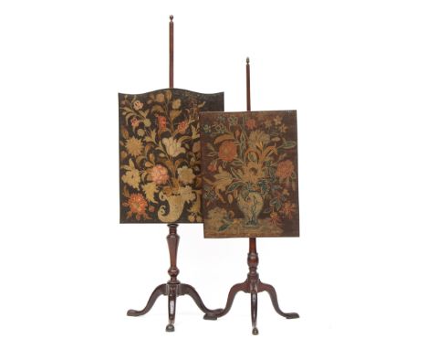 Two George III mahogany pole fire screens, each on tripod cabriole bases, with floral embroidered panels, 124cm and 145cm hig