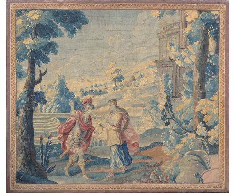 An 18th century Soho tapestry, depicting a knight and lady in a landscape, with maze in background, 181x156cmProvenance: from