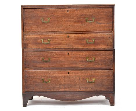 A 19th century teak campaign chest, in two sections, the secretaire drawer over three further graduating drawers, the top sec