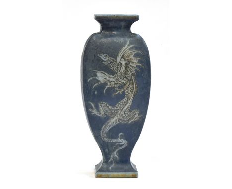 A late Victorian Martin Brothers stoneware vase of tapering form (chipped), decorated with dragons on a blue ground, incised 