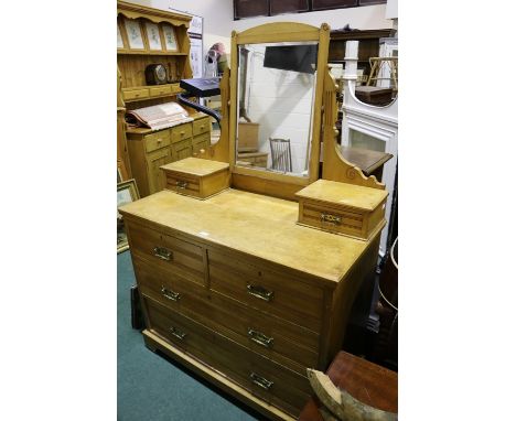Edwardian pine dressing table, with bevelled mirror flanked byn two small drawers, the base with two short and two long drawe