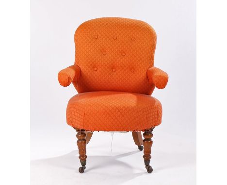 Victorian button back armchair, of small proportions, the stuff over back and seat flanked by arms above turned mahogany legs