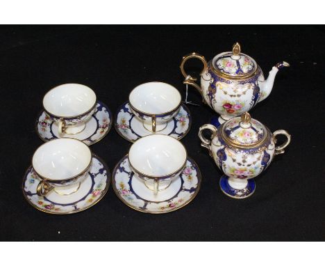 Noritake porcelain part tea service, consisting of four cups and four saucers, together with the coffee pot and sugar bowl