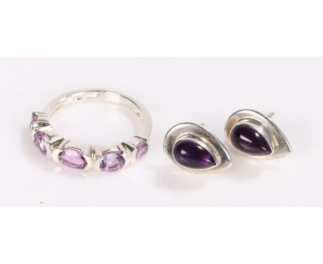 Pair of silver earrings and a silver ring 