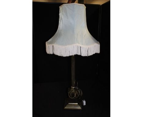 Brass reading lamp, of column form, 72cm high excluding tasselled shade