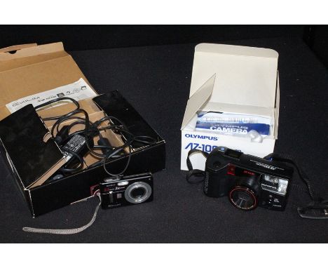A boxed Casio EX-Z57 Digital Camera together with a boxed Olympus AZ100 Camera, (2)