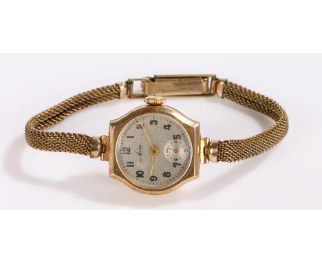 Avia 9ct gold ladies wristwatch., the signed silver dial wit Arabic numerals and subsidiary seconds dial, manual wound, the c