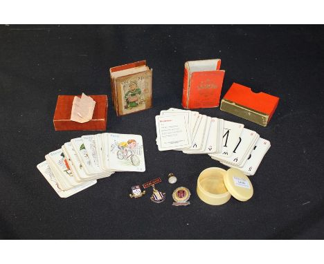 Victorian card game 'Old Maid', together with an early 'Lexicon' card game by Waddingtons, and a small tin containing three m