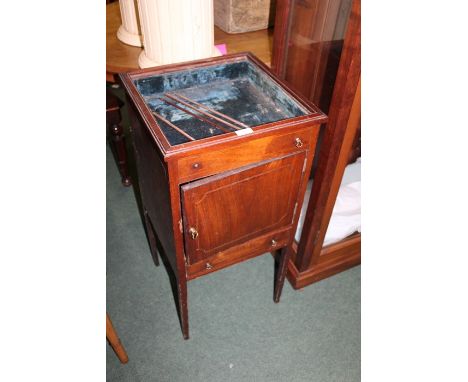 Victorian mahogany bijouterie cabinet, converted from a commode, with hinged lid above a cupboard door and drawer, on square 