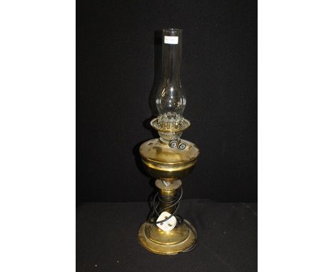 Brass oil lamp, now converted to an electric reading lamp