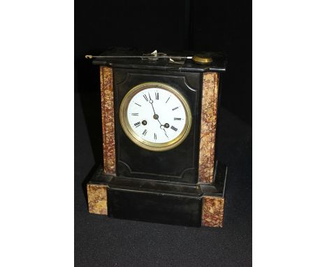 Edwardian slate and marble mantle clock, the enamel dial with Roman numerals, the french movement striking on a bell, 24cm wi
