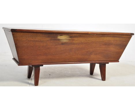 A vintage 20th Century dough bin table / coffer trough. Of rectangular form with a hinged lid opening to reveal a large open 