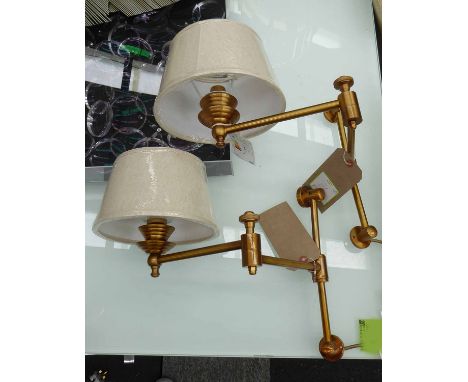 WALL LIGHTS, a pair, brass with adjustable arms and domed glass lamp. (3)