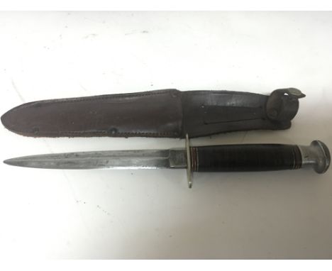 A Vintage william Rodgers Sheffield England double edged sheath knife