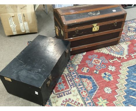 Dome top trunk with various vintage travel stickers and other box . Postage cat D