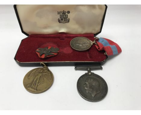 A collection of medals including two First World War DVR W collins R A 38298 .