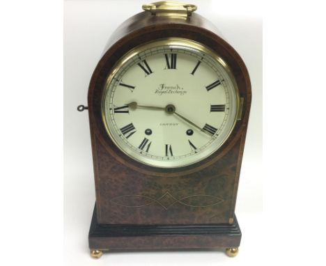 A fine quality eight day arch top mantle clock marked French Royal Exchange of London in inlaid burr walnut, approx height 38