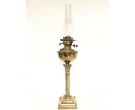 Victorian brass oil lamp with brass reservoir and funnel , approximately 72cm tall