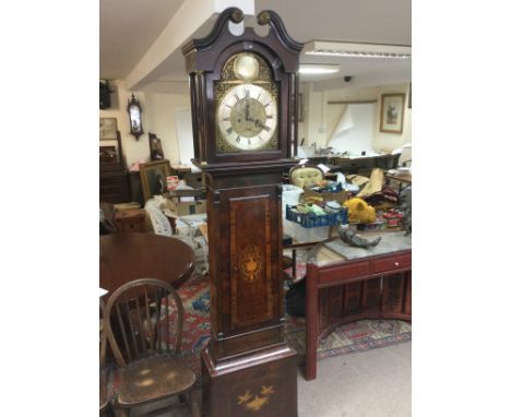 An inlaid mahogany longcase clock, eight day going, by John Carmichael of Greenock. Approx height 205cm. Shipping category D.