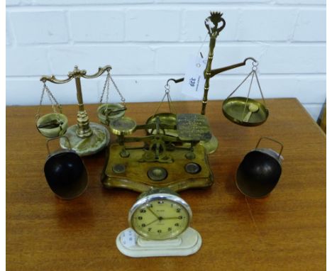 A mixed lot to include brass postal scales, two other scales and a pair of miniature copper coal scuttles and a Slava travel 