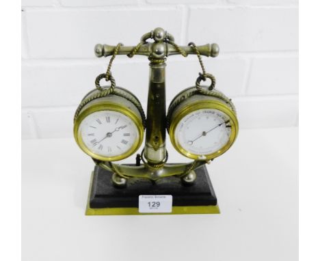 A desk clock and barometer mounted on a anchor base, 21 x 16cm 