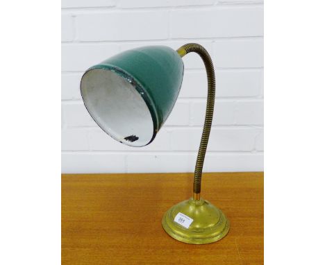 A vintage brass and green enamel table lamp