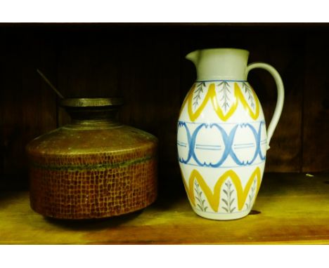 A large Buchan pottery jug, with blue and yellow stylised pattern, together with an Eastern copper water vessel and ladle, ta