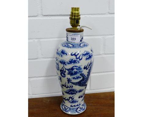A Chinese blue and white baluster table lamp base painted with Dragon and Pearl of Wisdom pattern