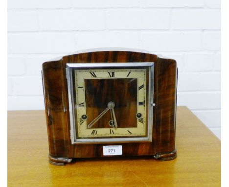 An Art Deco mantle clock, the square dial with Roman numerals, 29 x 23cm