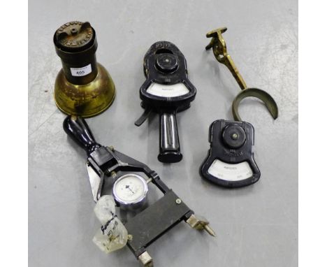 A mixed lot to include a battery tester, an amp meter and a Sherwood wind up paraffin lamp, (3) 