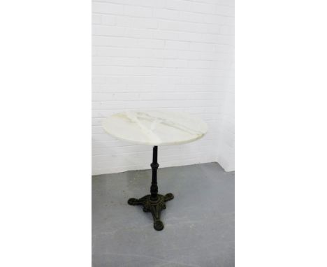 A marble topped table on cast iron tripod support, 73 x 68cm
