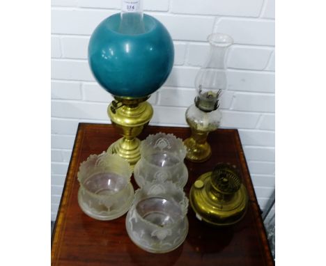 Two vintage oil lamps, three etched glass shades and a brass lamp (a lot) 
