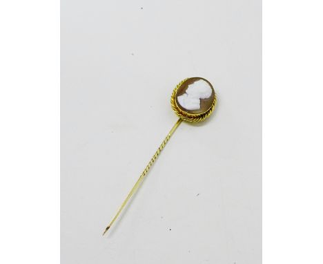 A 19th century yellow metal and shell cameo stick pin, depicting Lord Byron, 9cm long