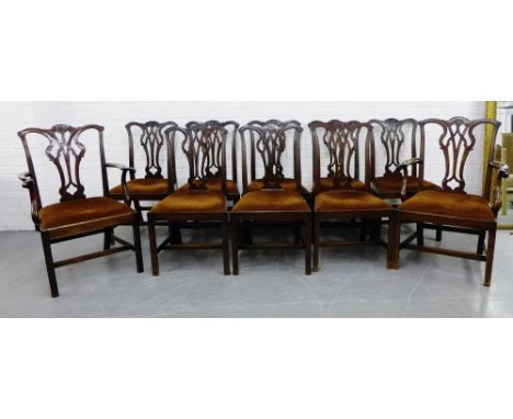 A set of ten mahogany Chippendale style dining chairs with shaped top rails over interlaced splats above upholstered slip in 