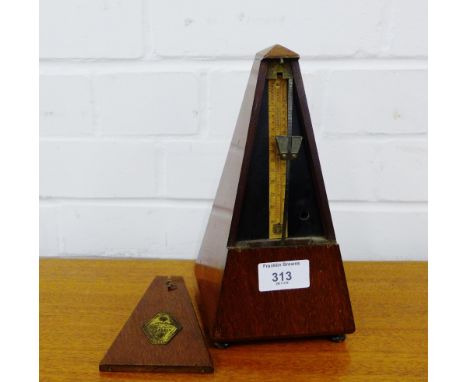 A French mahogany cased metronome, 23cm high