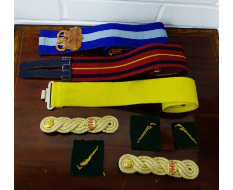 A collection of militaria to include Malaysian army engineers stable belts, shoulder patches and epaulette's (a lot) 