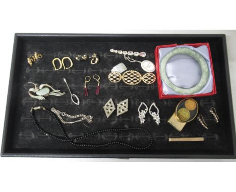 Costume jewellery to include: Two Christian Dior brooches and a hardstone bangle 