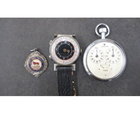 A vintage Football Referees wrist stopwatch (not working) together with a metal and enamel Oxfordshire Football medal and a J